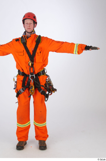 Photos Sam Atkins Fireman in Orange Coveralls standing t poses…
